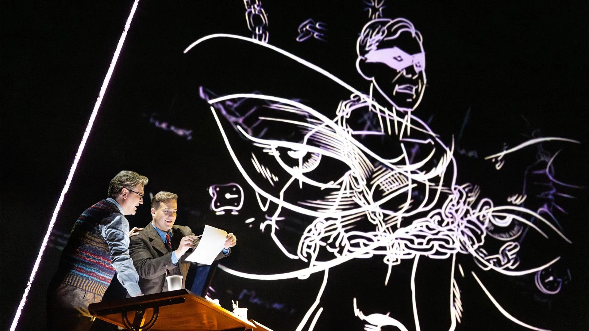 Photograph of boy and girl on stage