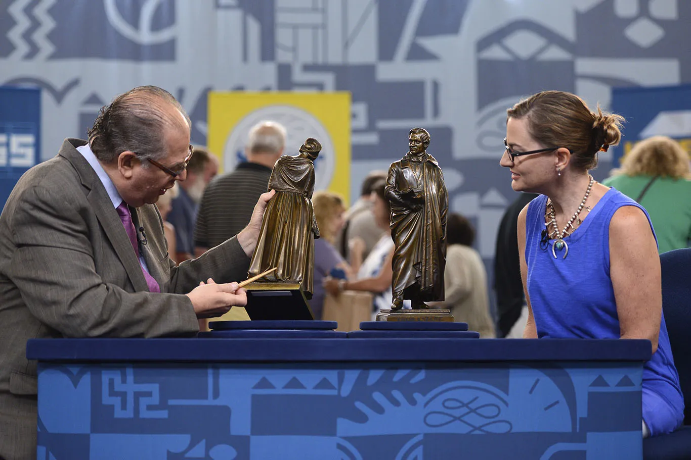 ANTIQUES ROADSHOW guests excited to have their items appraised in Virginia Beach, Virginia.