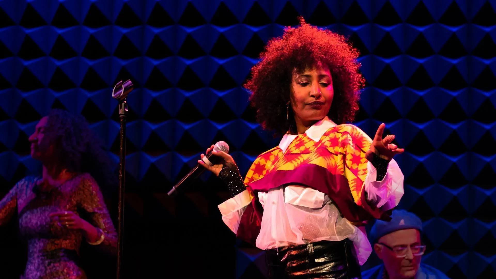 Photograph of woman on stage