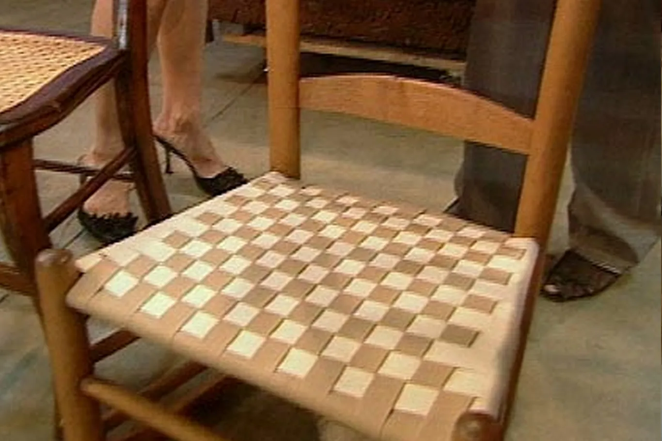 A chair with a damaged finish.