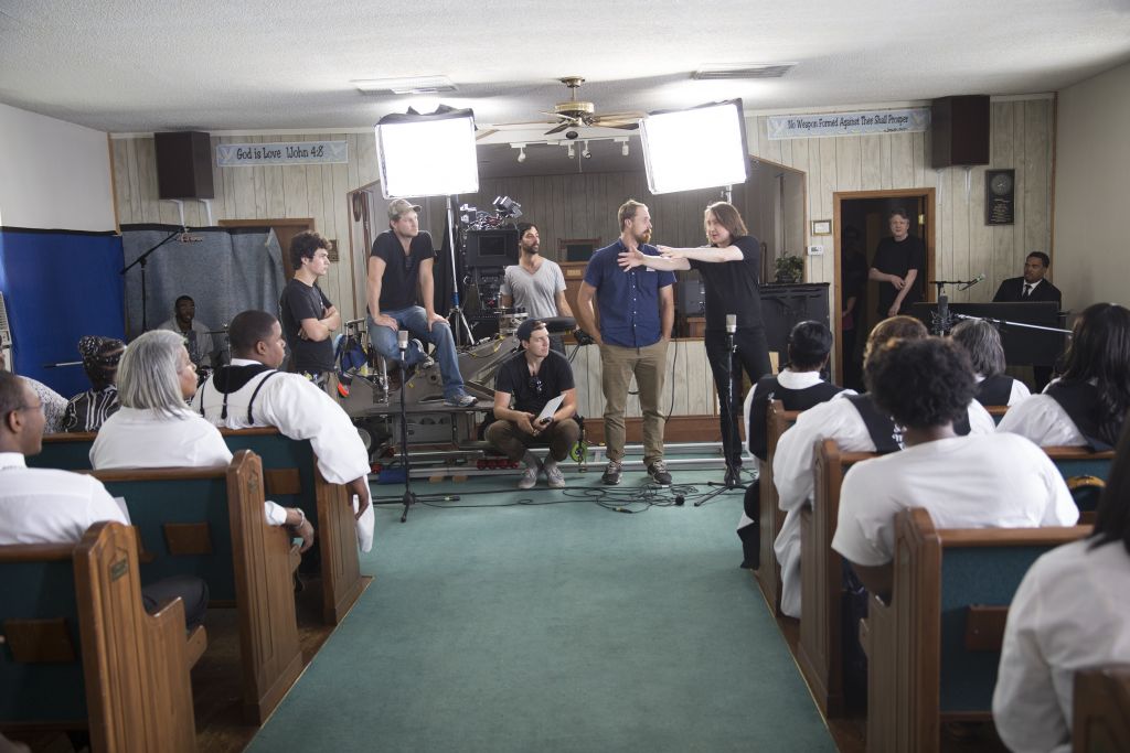 Director Bernard MacMahon filming the Triumph Church Choir in Cheraw, SC for “American Epic: Blood and Soil.” Credit: ©2017 Lo-‐Max Records Ltd.