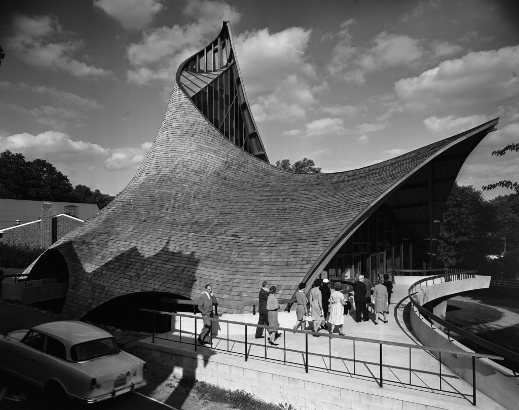 Parishioners dressed in their 1960s Sunday best file inside this unusual church designed by architect Joseph Salerno in 1962. The design won the American Institute of Architects' highest award in 1963.