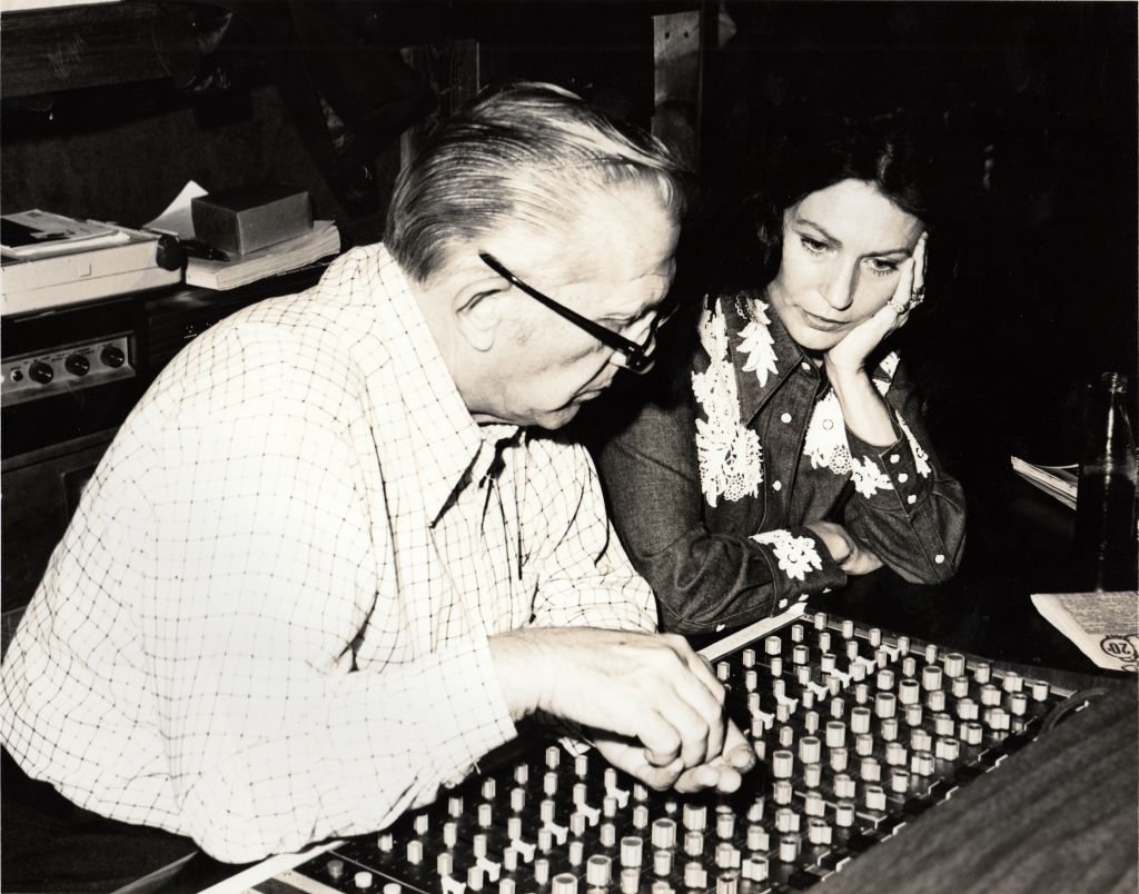 Loretta Lynn in the studio at the sound board with Owen Bradley.