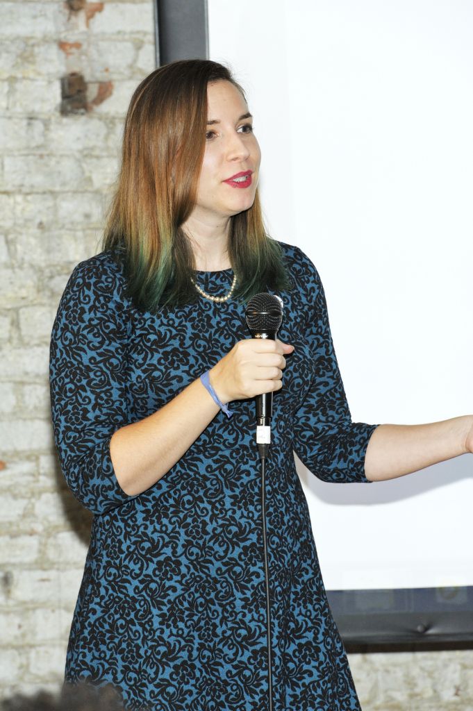 "Inspiring Woman" Supervising Producer Kait Hoehne addresses the audience.