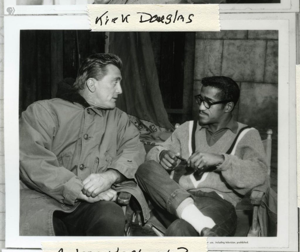 Sammy Davis, Jr. sitting down with Kirk Douglas. Credit: Sammy Davis, Jr. Estate
