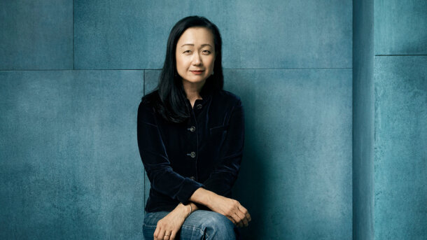 Min Jin Lee sitting.