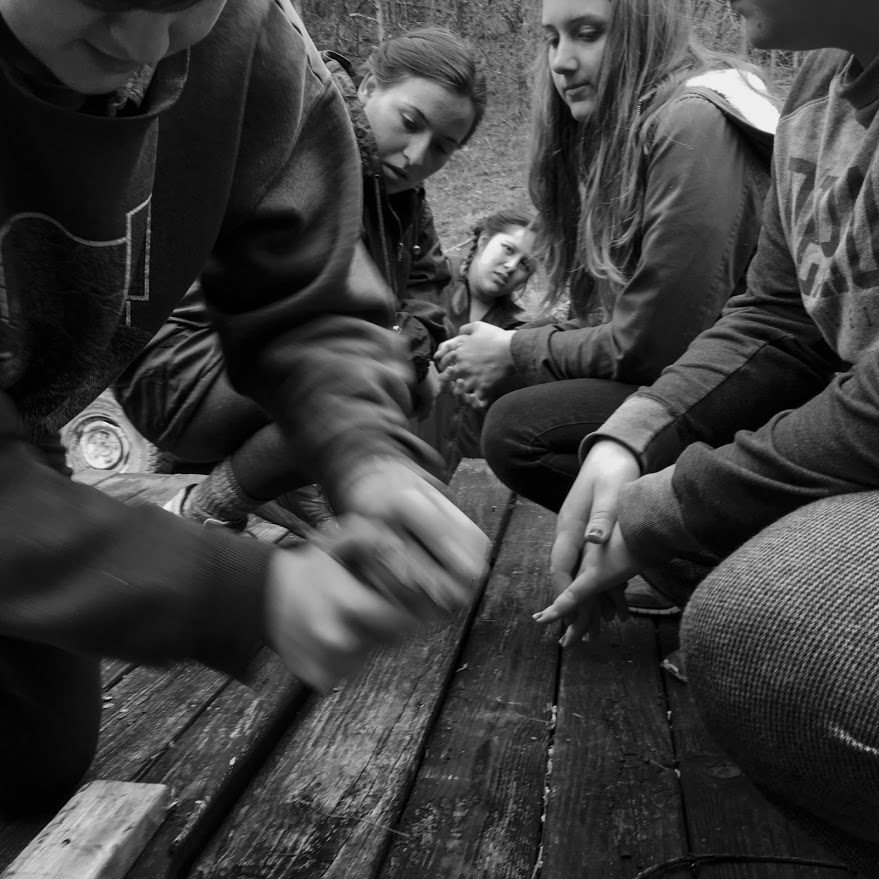Students from DePaul University work on building a new porch at the home of Levi and Luwonna Burkhart in Coldiron, Kentucky