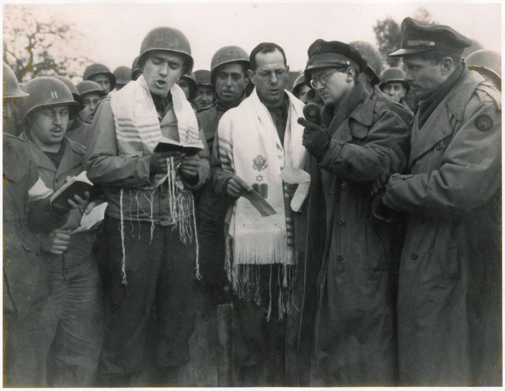 Max Fuchs and Rabbi Chaplain Sidney Lefkowitz. He is singing in Aachen, Germany during the first Jewish service to be held on German soil since the rise of Hitler