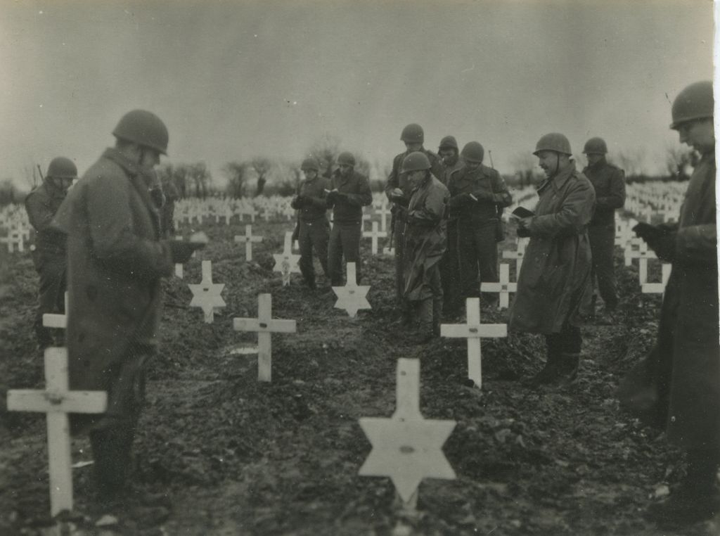Rabbi Chaplain Marcus leading prayer service in cemetery in France. Photo courtesy Tamara Green and Roberta Marcus Leiner