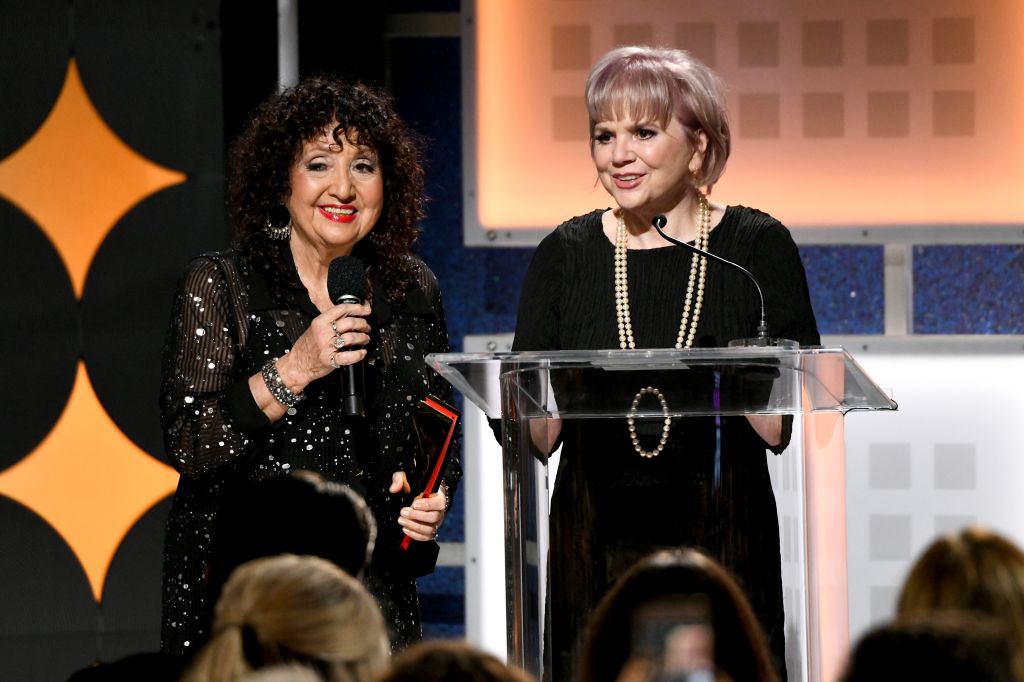 BEVERLY HILLS, CALIFORNIA - JANUARY 11: Linda Ronstadt (R) accepts Best Documentary for 'Linda Ronstadt: The Sound of My Voice' from Maria Muldaur onstage during AARP The Magazine's 19th Annual Movies For Grownups Awards at Beverly Wilshire, A Four Seasons Hotel on January 11, 2020 in Beverly Hills, California. (Photo by Michael Kovac/Getty Images for AARP)