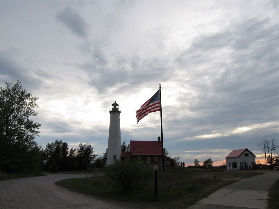Photo by Chriss Halleck - A storm was rolling in over Lake Huron at the Tawas Point Lighthouse in Tawas Michigan