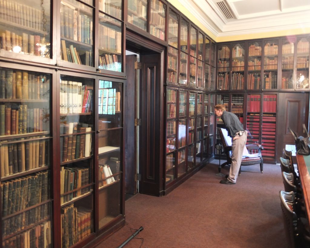 Caption: Andrew Coulson explores Carpenter’s Hall in Philadelphia as he looks for answers to why there has been constant conflict over what is taught in public schools, in the new documentary, School Inc. Credit: Kay Krewson 
