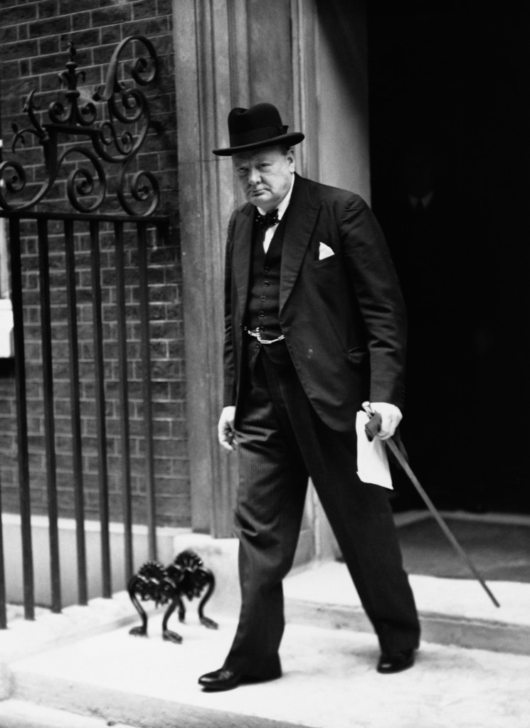 Prime Minister Winston Churchill leaving a building