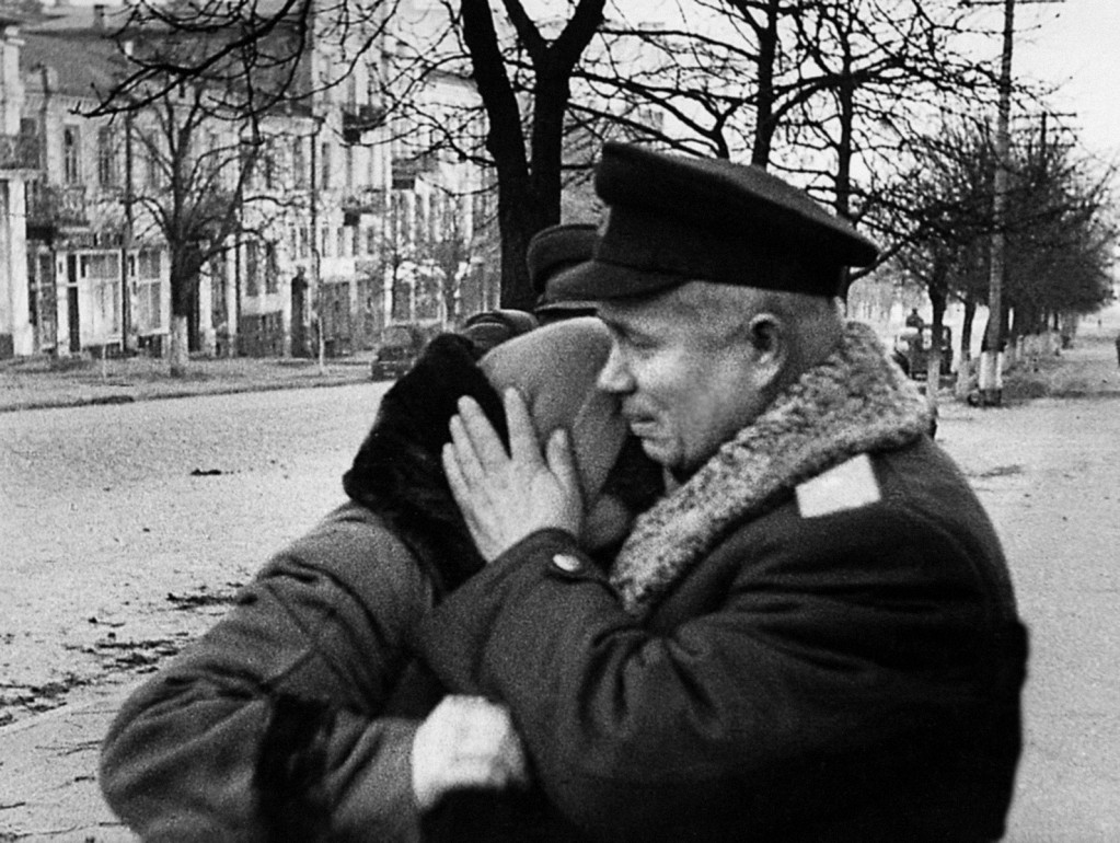 Nikita Khrushchev consoles a Russian lady