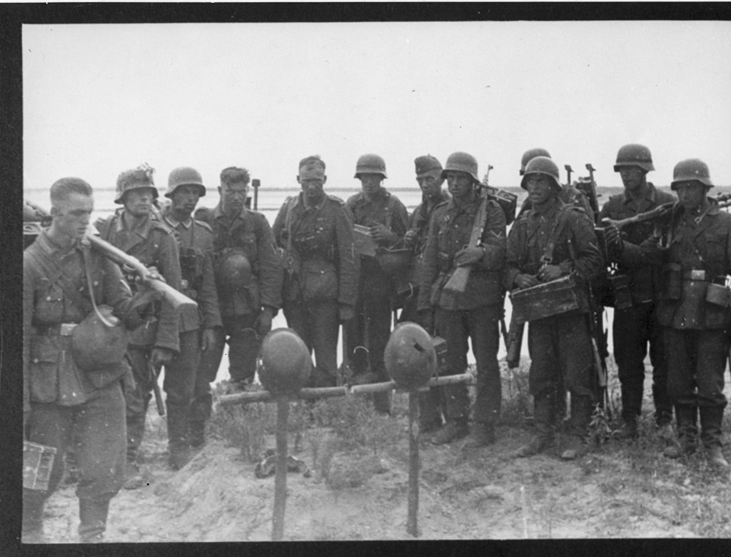 German soldiers bury their dead comrades.
