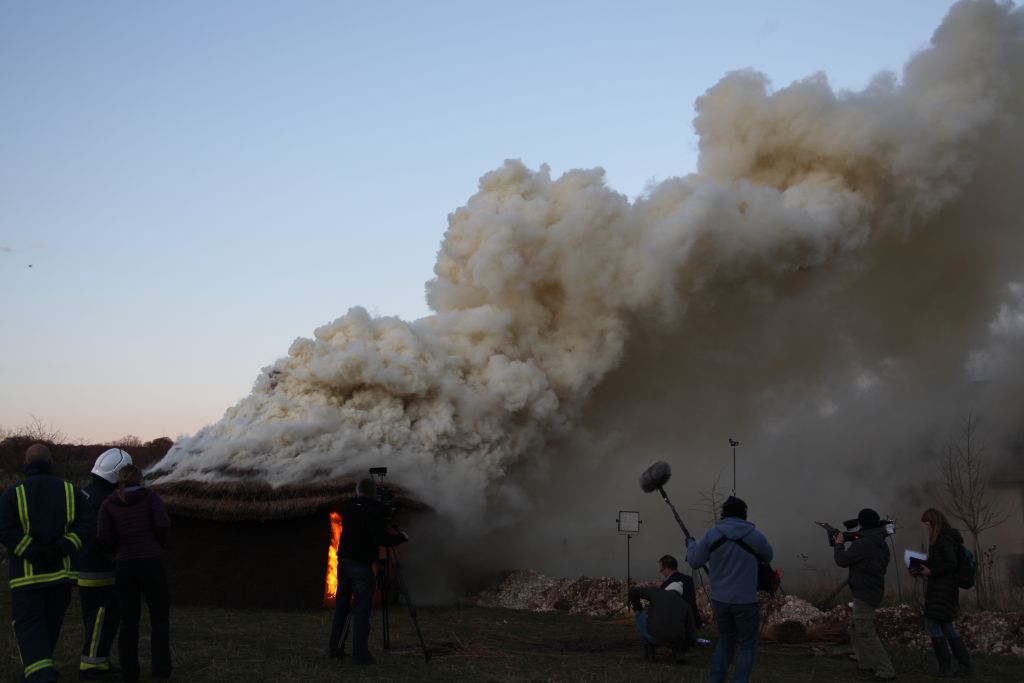 Early stages of house fire – lots of smoke. Firemen and Tom Pridham look on