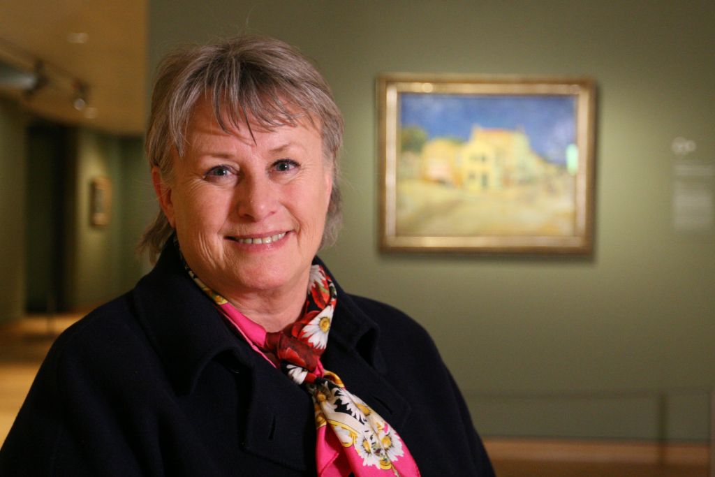 Portrait of Bernadette Murphy  with Van Gogh's The Yellow House (The Street), 1888 in the background