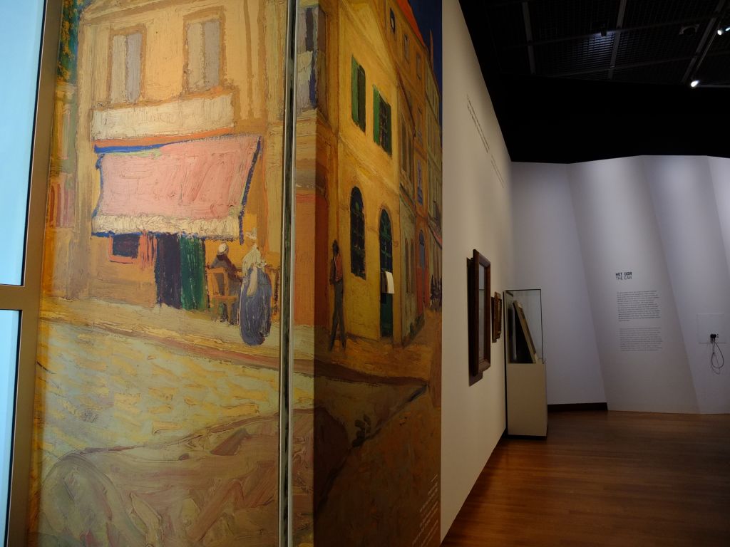 Exhibition screen prepared with image of Van Gogh's The Yellow House