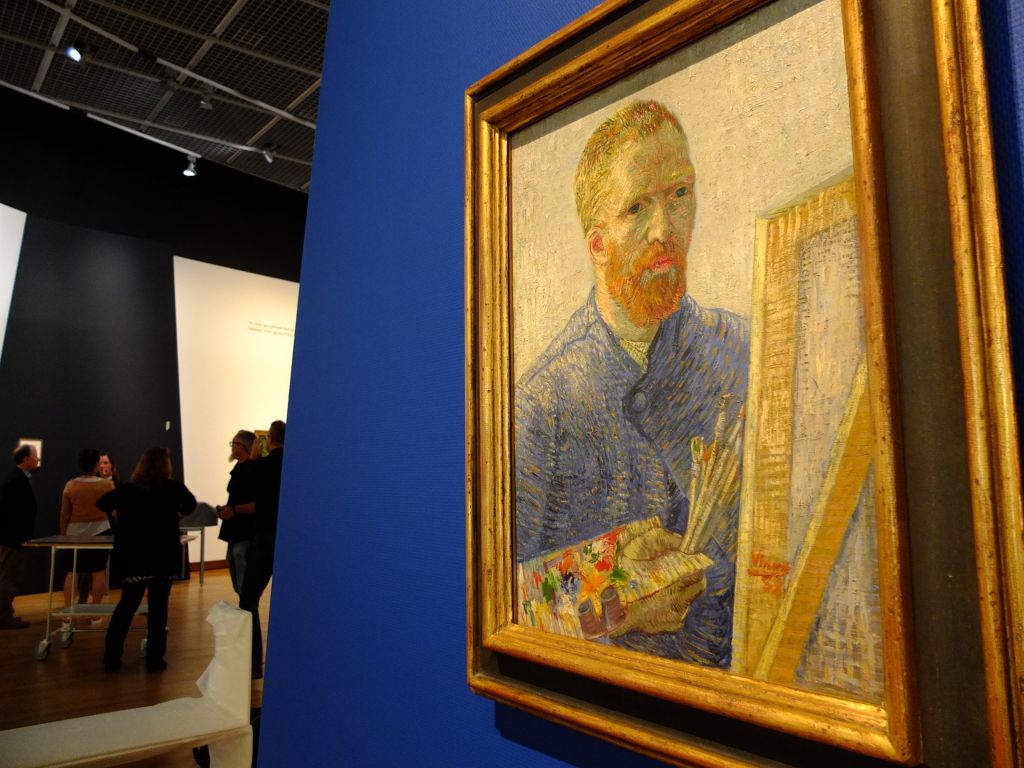 Wide shot gallery during preparations for exhibition "On the Verge of Insanity:  Van Gogh & His Illness" with Van Gogh's Self-Portrait as a Painter", 1887-88, foreground